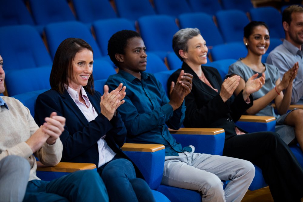 business-executives-applauding-business-meeting